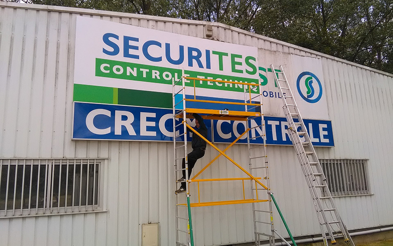 Pose de l'enseigne Securitest